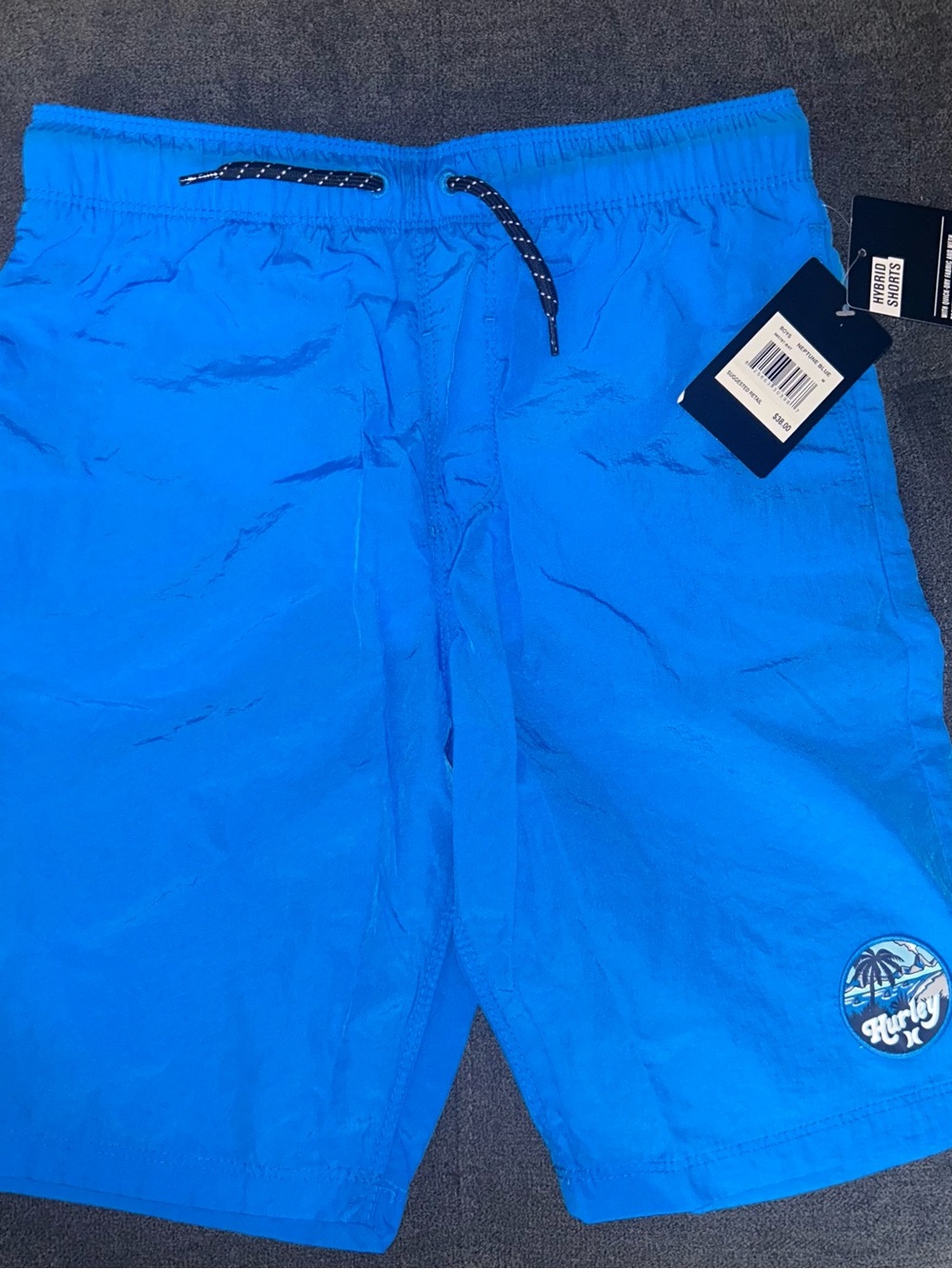 Hurley Bright Blue Swim Shorts - size youth medium. NWT
